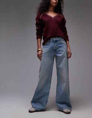 Topshop - Horizon - Jeans in Bleach-Waschung mit weitem Bein und mittelhohem Bund-Blau