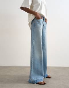 Horizon mid rise wide leg jean with let down hem detail in vintage blue
