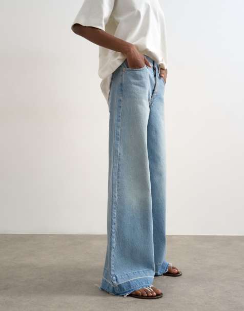 Topshop Horizon mid rise wide leg jeans with let down hem detail in vintage blue - view 1