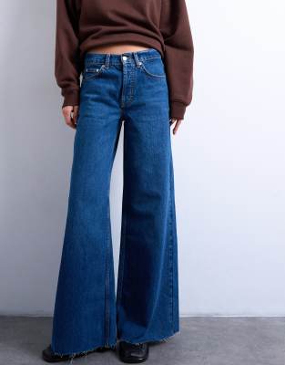Topshop Horizon Mid Rise Wide Leg Jeans With Raw Hem In Blue