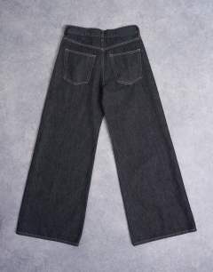 Model wearing Horizon wide leg jeans in black rinse