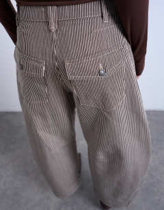 Model wearing Horseshoe high rise barrel jean in brown stripe