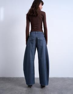 Model wearing Horseshoe high rise barrel jean in elephant grey