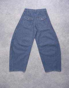 Model wearing Horseshoe high rise barrel jean in elephant grey