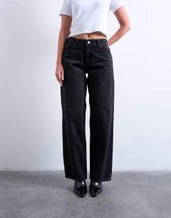 Model wearing Hourglass Cinch relaxed jean in washed black