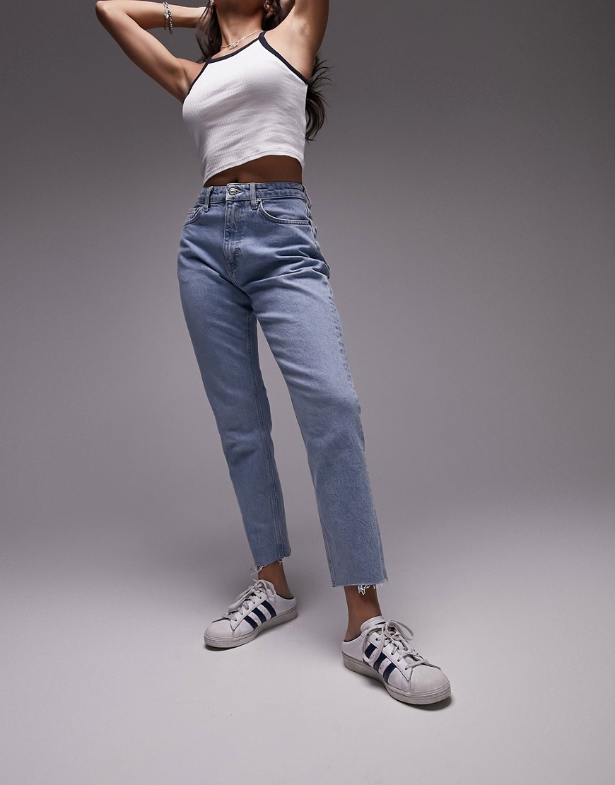 cropped mid rise straight jeans with raw hems in bleach-Blue