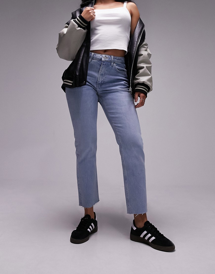 cropped mid rise straight jeans with raw hems in bleach-Blue