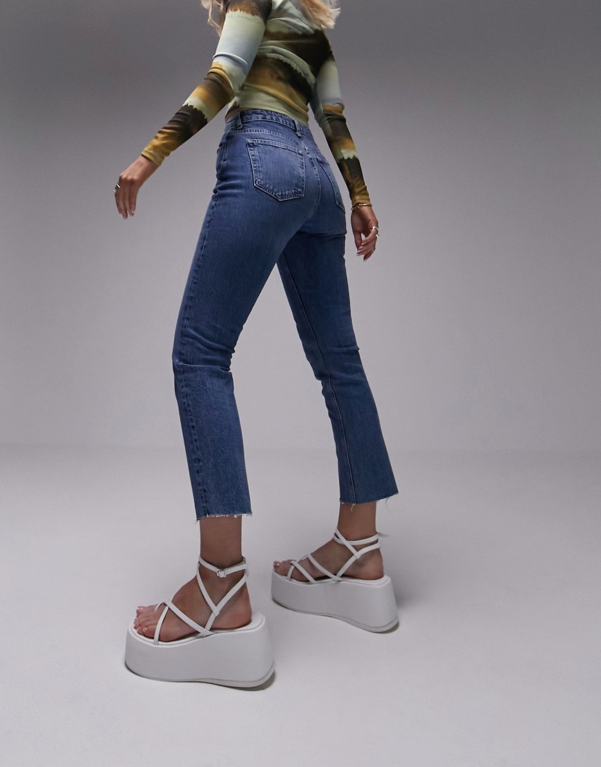 Topshop Hourglass cropped mid rise straight jeans with raw hems in mid blue