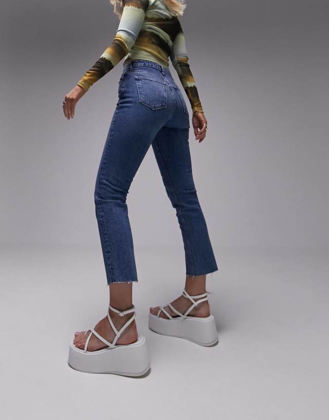 Topshop Hourglass - cropped mid rise straight jeans with raw hems in mid blue