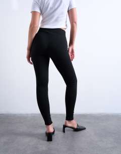 Model wearing Full length heavy weight legging in black