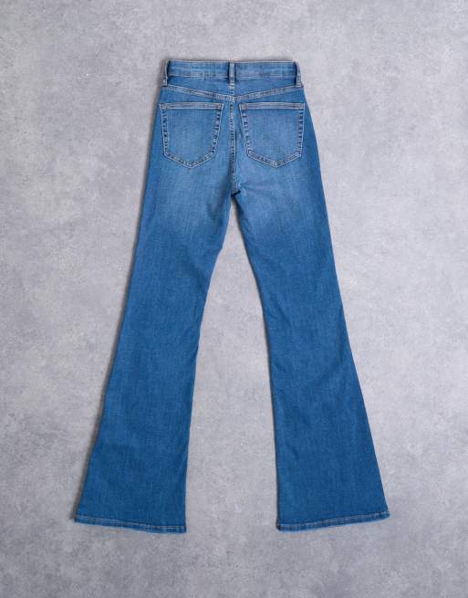 Topshop Hourglass Jamie Flare high rise jeans in mid blue ASOS