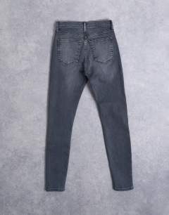 Model wearing Hourglass Jamie high rise skinny jean in washed black