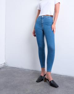 Model wearing Hourglass Joni high rise super skinny jean in mid blue