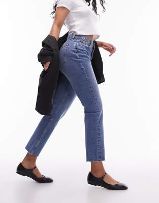 mid rise straight cropped jean with raw hems in mid blue