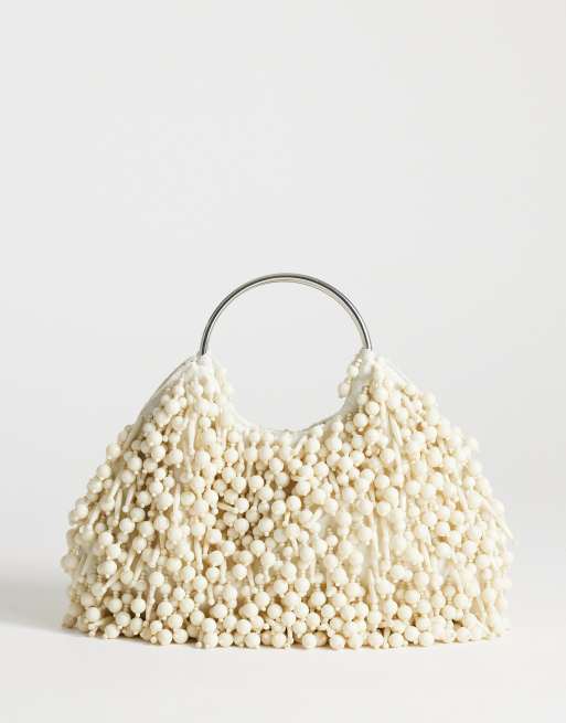 Topshop - Hunter - Borsa a mano con perline color avorio con manico in metallo