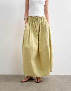 Model wearing Hybrid balloon maxi skirt in khaki