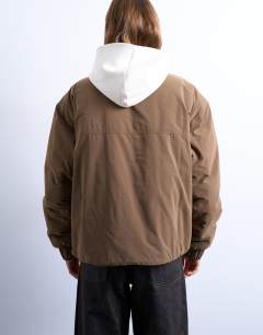 Model wearing Hybrid padded jacket in mushroom