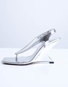 Model wearing Indie wedge sandal in silver