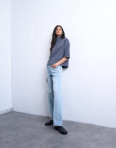 Model wearing Interlock funnel neck top in charcoal grey