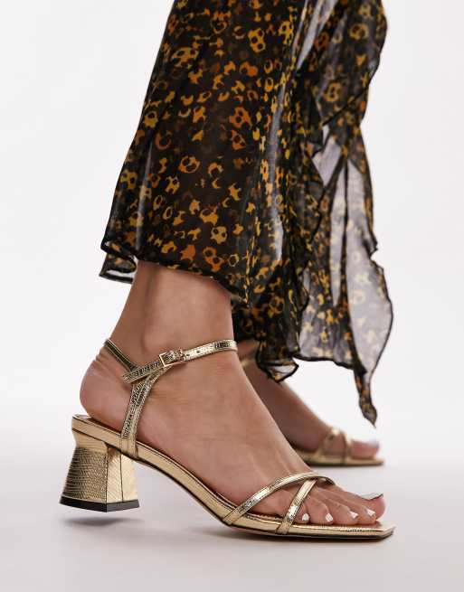 Topshop - Iona - Sandalen met brede pasvorm, blokhak en smalle bandjes in goud met hagedissenmotief