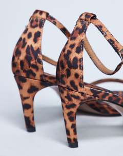 Model wearing Isabelle 2 part banana heel sandal in leopard print