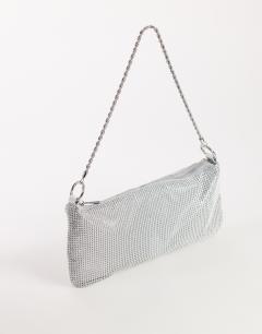 Model wearing Jackie small diamante shoulder bag in silver
