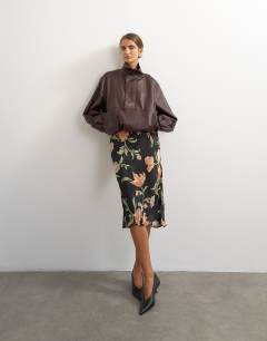 Model wearing Jacquard 90s length skirt in spot floral print