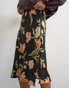 Model wearing Jacquard 90s length skirt in spot floral print