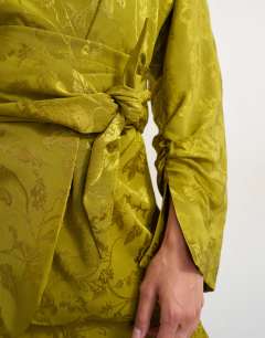 Model wearing Jacquard kimono in green