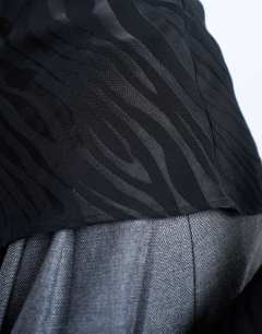 Model wearing Jacquard zebra slash neck long sleeve in black
