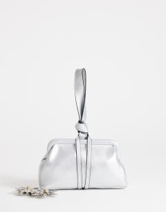 Model wearing Jade mini loop grab bag in silver