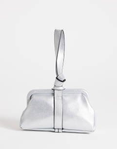 Model wearing Jade mini loop grab bag in silver
