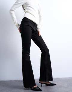 Model wearing Jamie flare high rise jean in black