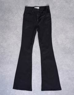 Model wearing Jamie flare high rise jean in black