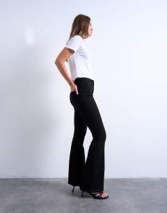 Model wearing Jamie flare high rise jean in black