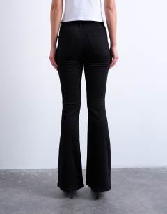 Model wearing Jamie flare high rise jean in black