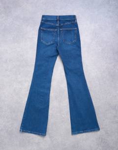 Model wearing Jamie flare high rise jean in rich blue