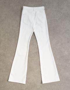 Model wearing Jamie Flare high rise jean in white