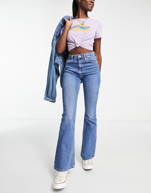 Topshop Tall Jamie flare jeans in mid blue