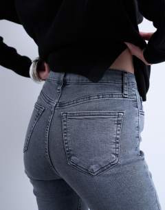 Model wearing Jamie high rise skinny jean in grey