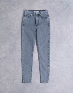 Model wearing Jamie high rise skinny jean in grey