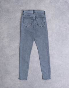 Model wearing Jamie high rise skinny jean in grey