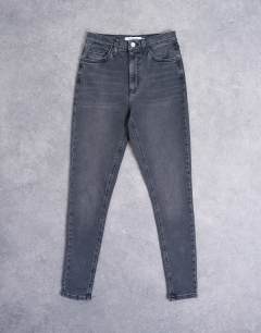 Model wearing Jamie high rise skinny jean in washed black