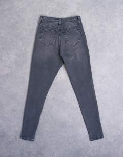 Model wearing Jamie high rise skinny jean in washed black
