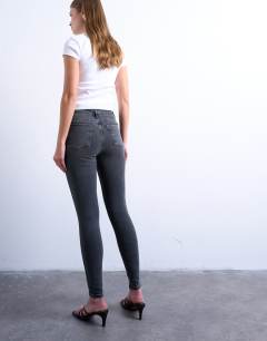 Model wearing Jamie high rise skinny jean in washed black