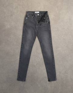 Model wearing Jamie high rise skinny jean in washed black