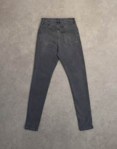 Model wearing Jamie high rise skinny jean in washed black