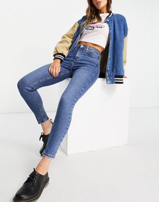 Topshop Jamie jeans with abraided hem in mid blue