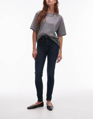 Topshop - Jamie - Jeans in Blau-Schwarz mit hohem Bund