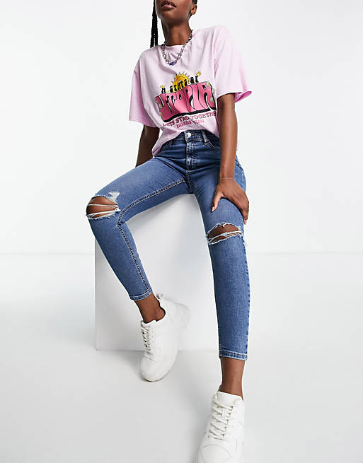 Topshop Jamie jeans with knee rips in mid blue